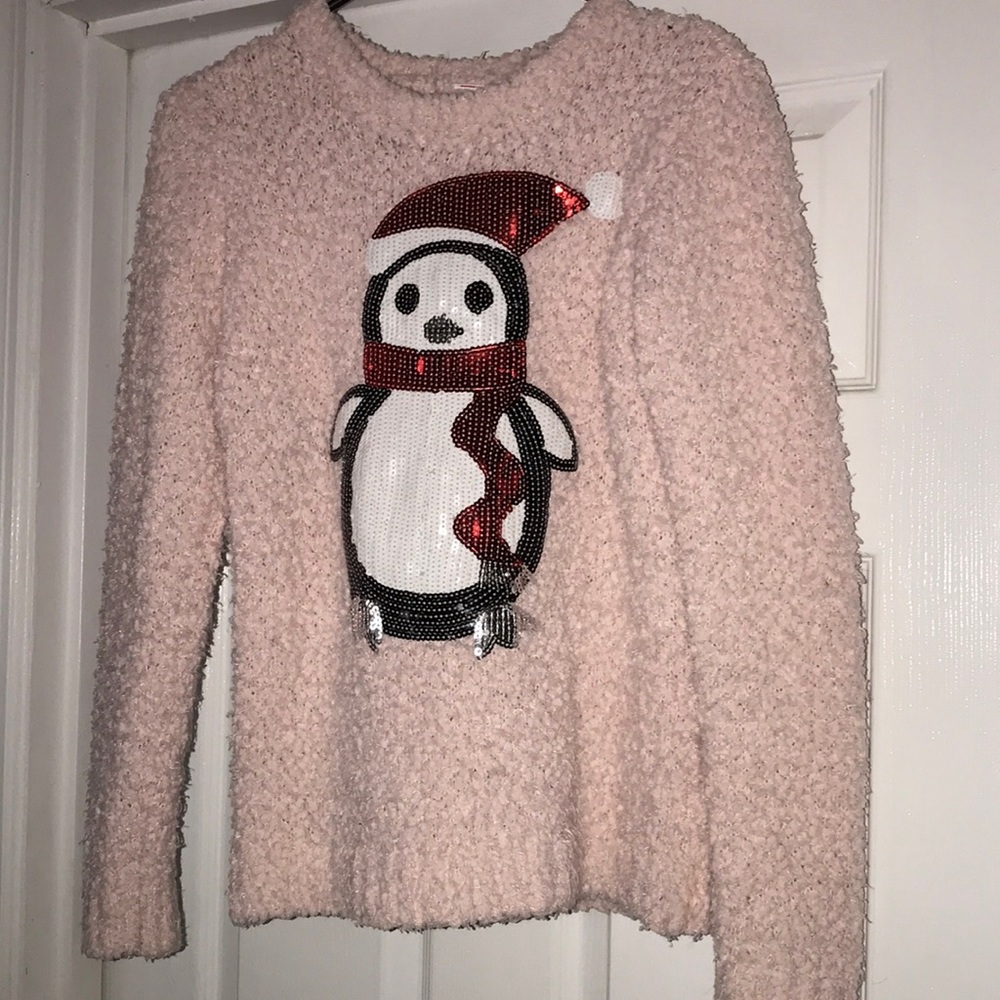 Pink sweater with penguin on the front